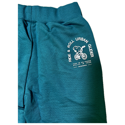 Spodnie dresowe chłopięce GT - kolor morski